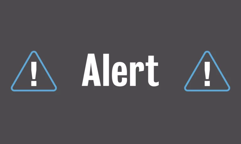 A digital image displaying a phone screen with an alert icon and the word 'ALERT' in capital letters, surrounded by two warning signs and a caution sign.