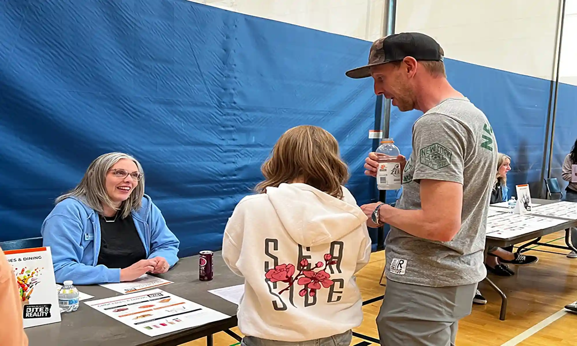 student at bite of reality table