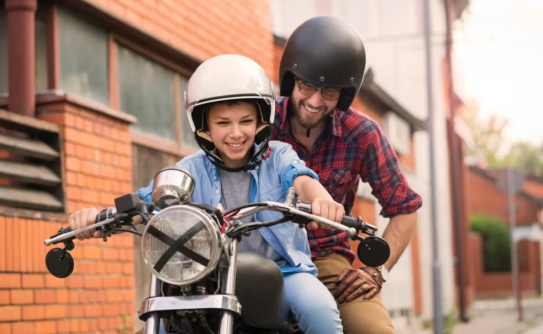 Father and son on a motorcycle