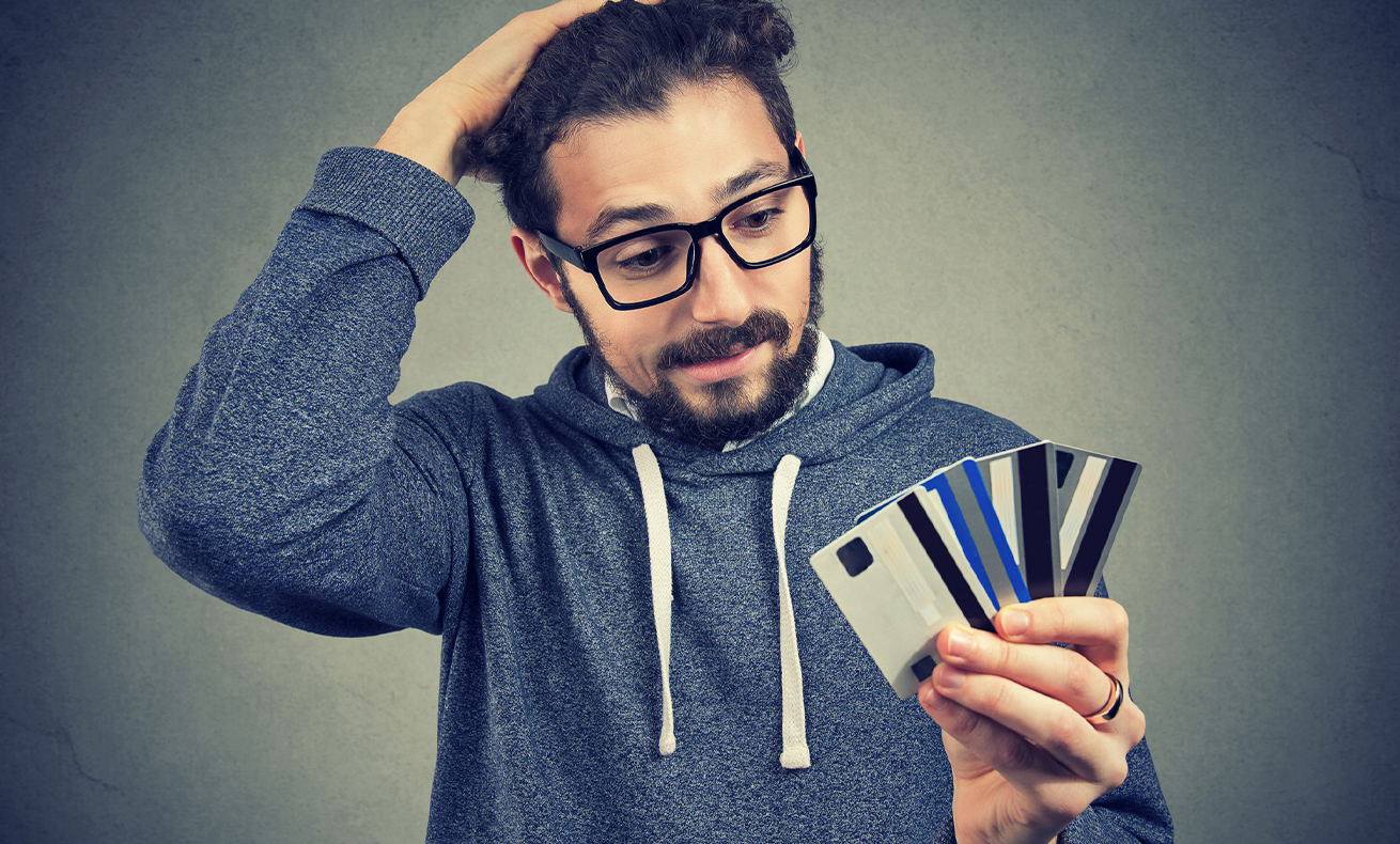 Person holding playing cards