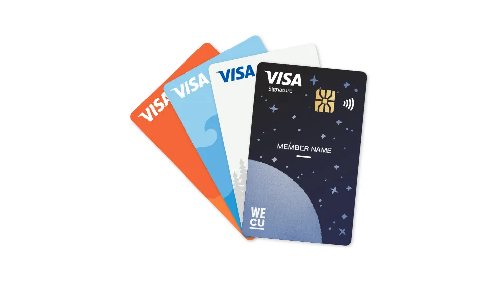 Three stacked credit cards, with one card in front, featuring the logo of Visa.