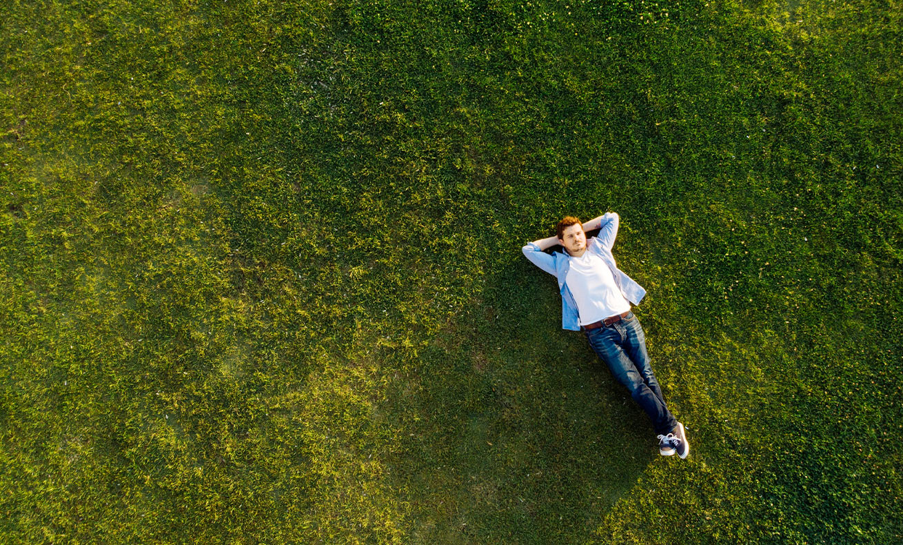 Man relaxing on the grass.