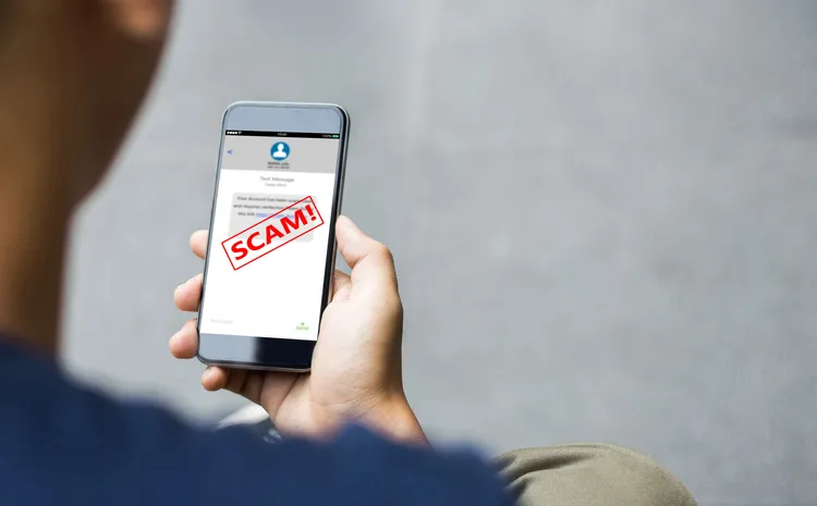 Phone with notification of scam.